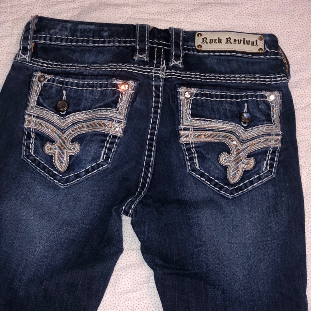 Rock Revival Janelle Mid Rise Skinny. Size 27